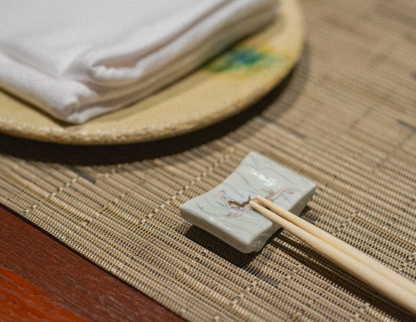 Elegant Japanese dining setup with chopsticks and cloth napkins