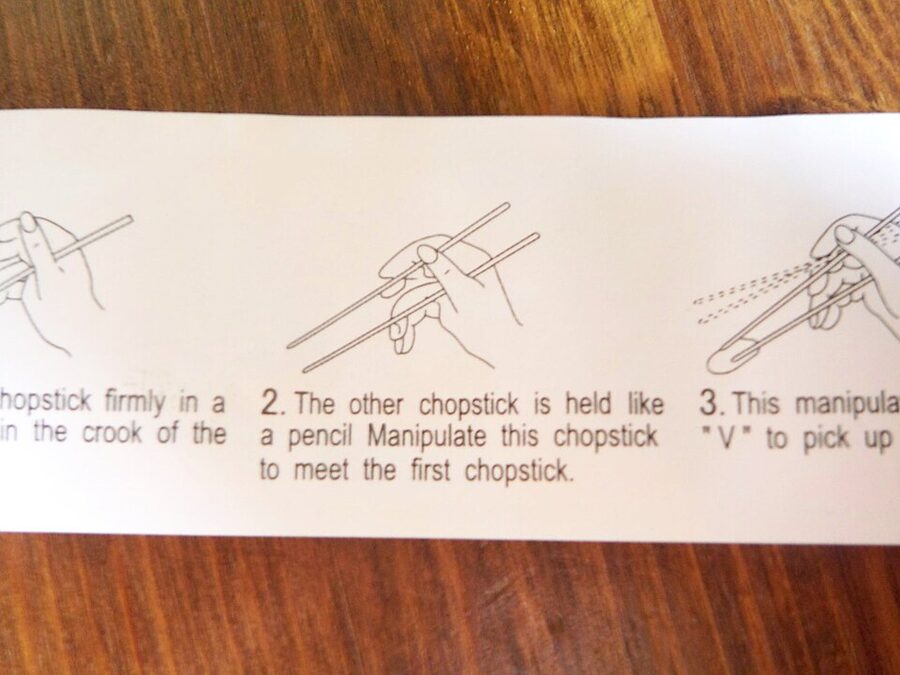 Japanese instructional poster showing how to use chopsticks