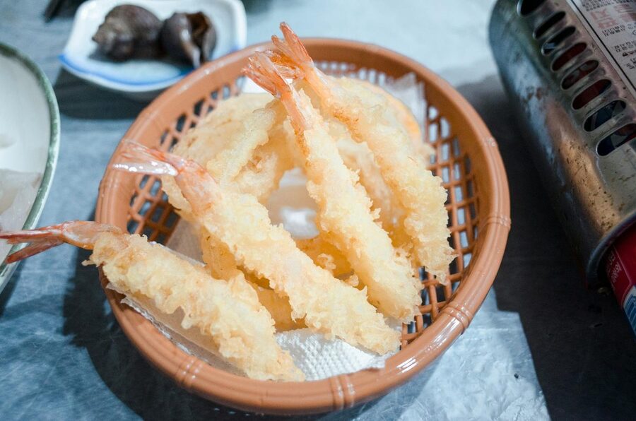 Shrimp tempura served in a woven basket