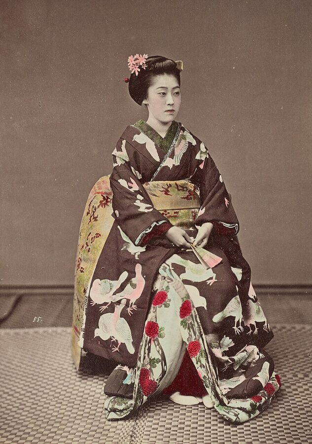 Meiji-era photograph of a seated Japanese woman in kimono by Kusakabe Kimbei