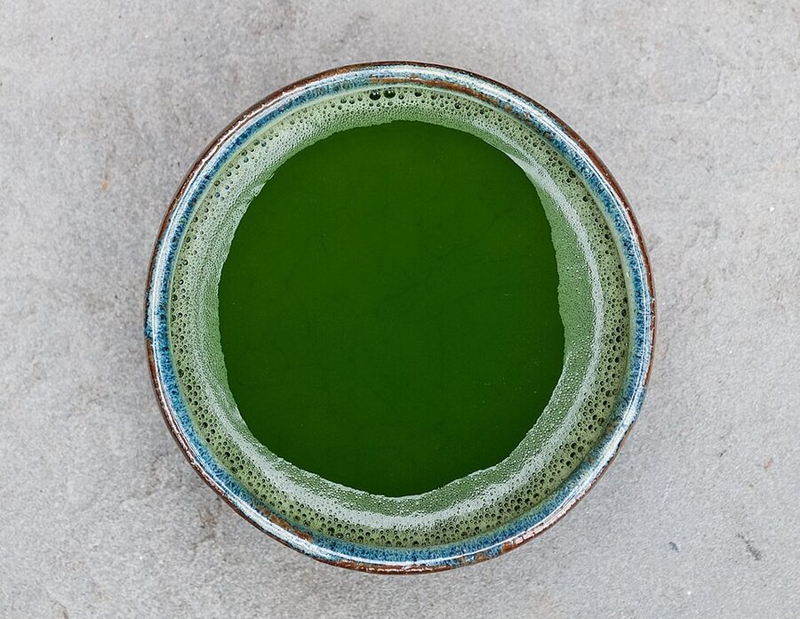 Ceremonial grade matcha whisked in a traditional chawan bowl