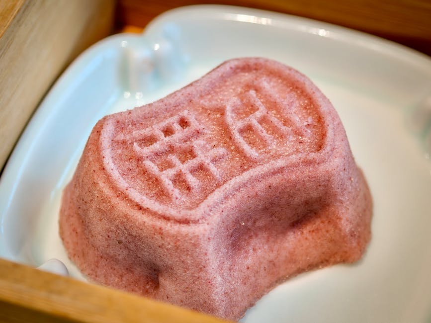Pink nerikiri wagashi with traditional design