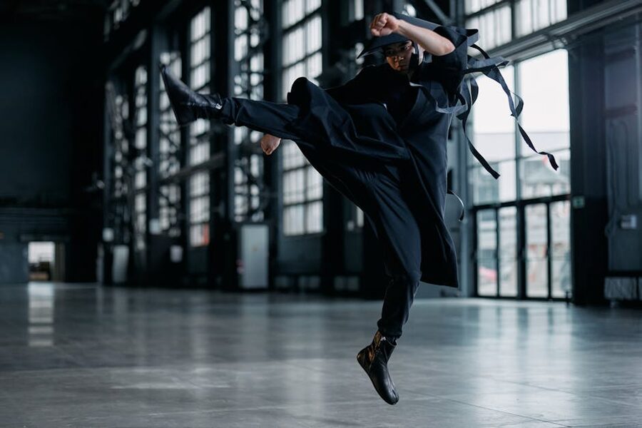 Ninja executing a jump kick in training