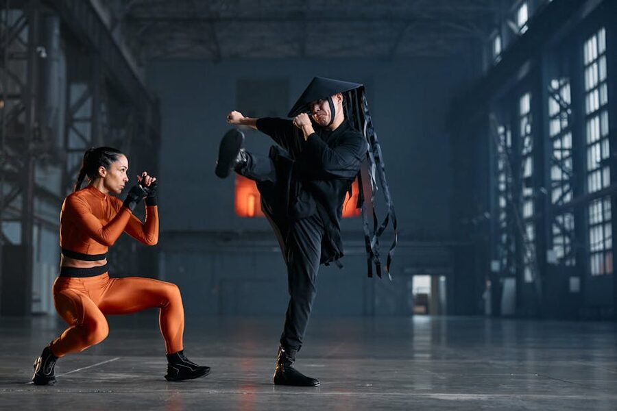 Two ninja cosplayers in training stance