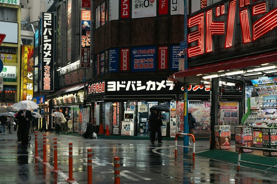 Shinjuku rainy night with illuminated neon signs
