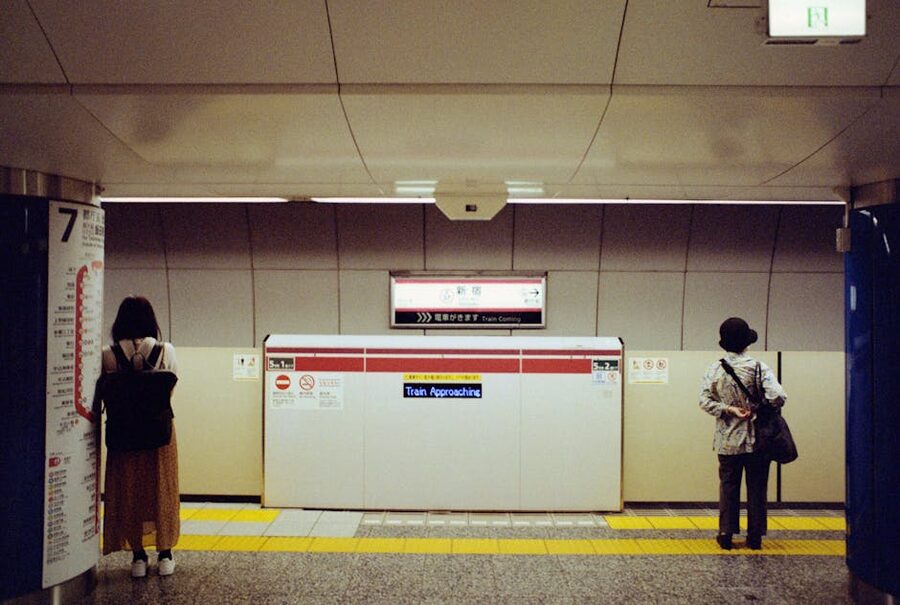 Tokyo subway station commuters waiting for trains