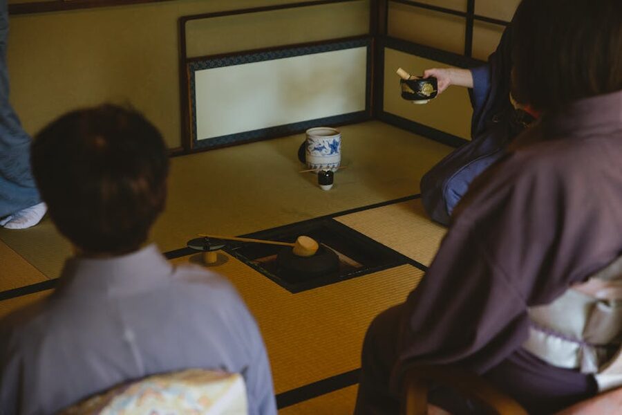 Bamboo ladle and tea utensils on tatami mat
