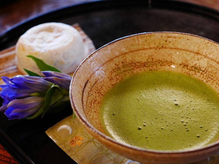 Matcha green tea served in a Japanese teahouse setting