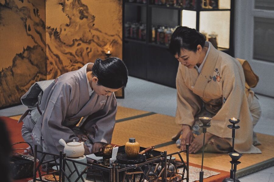 Two women in traditional kimonos at a Japanese tea ceremony