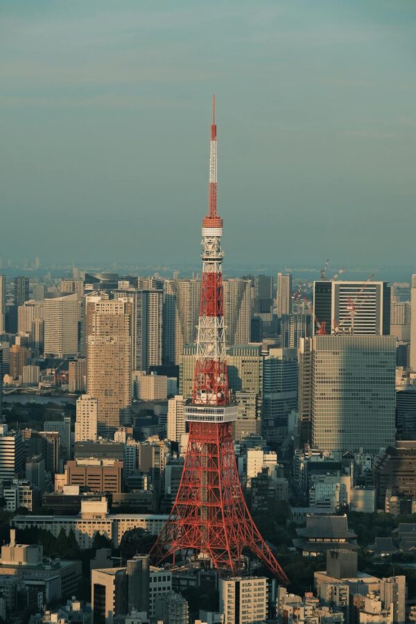 Aerial shot of Tokyo Tower rising above the Tokyo city skyline