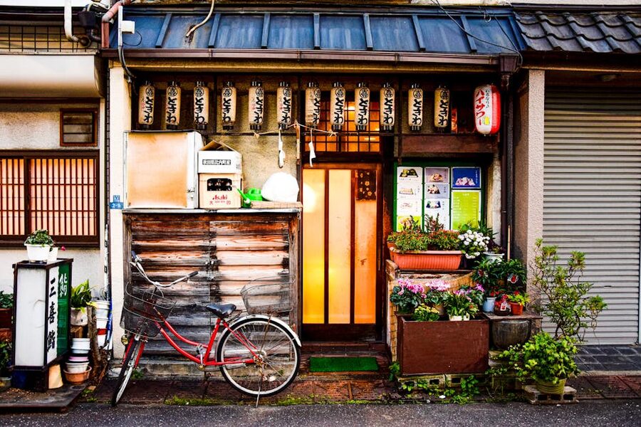 Traditional Japanese shopfront in Tokyo with bicycle