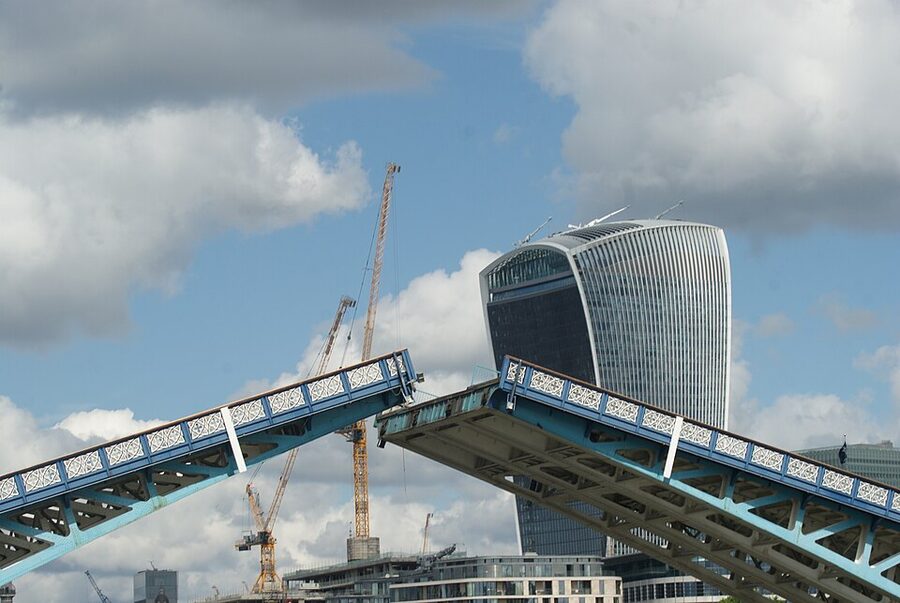 Tower Bridge bascules opening Thames barge