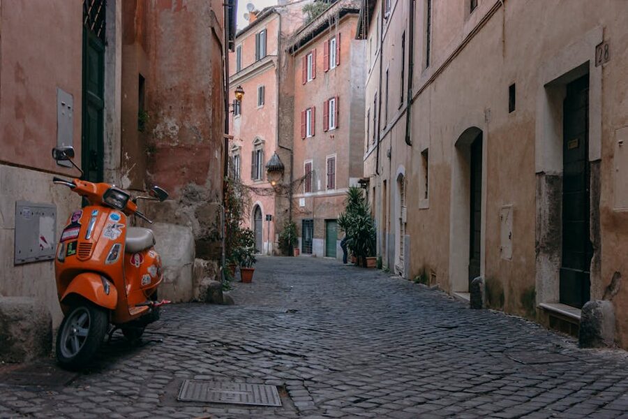 Trastevere cobblestone street with scooter Rome