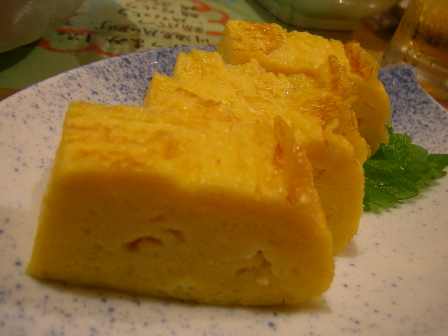 Tsukiji tamagoyaki rolled egg omelette on skewer