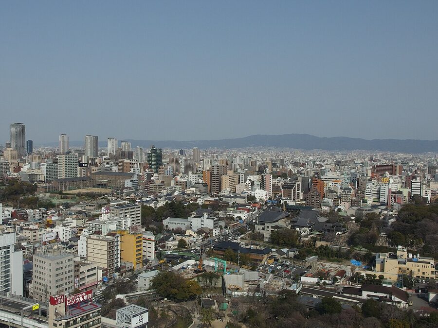 Tsutenkaku Tower with signage below