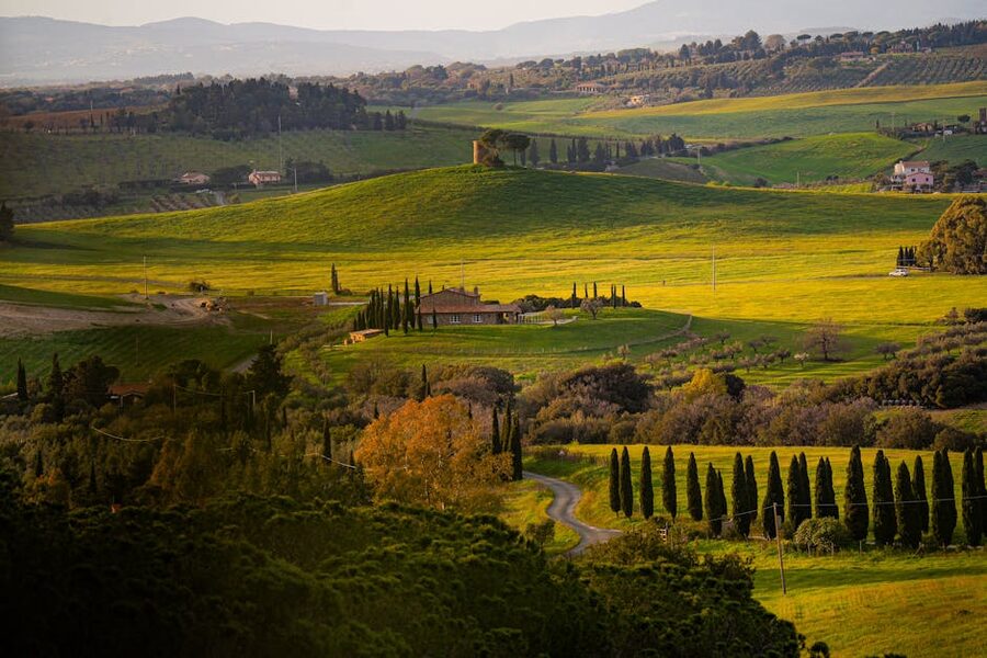 Aerial view of Tuscany rolling hills at sunset