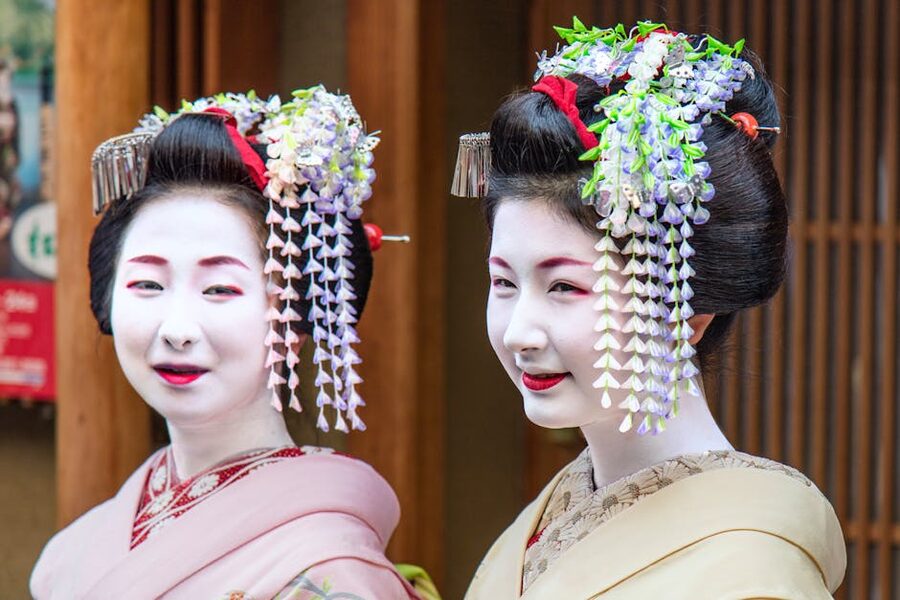 Two geisha in traditional kimono in Kyoto