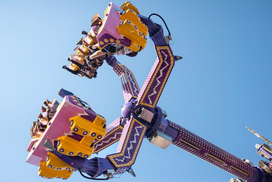 Carnival ride against blue sky