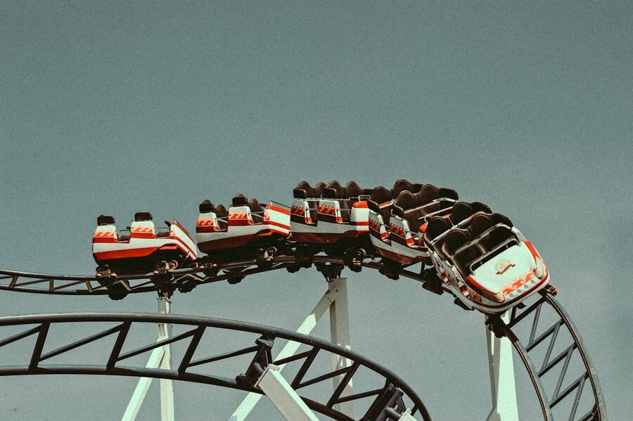 Rollercoaster ride against bright sky
