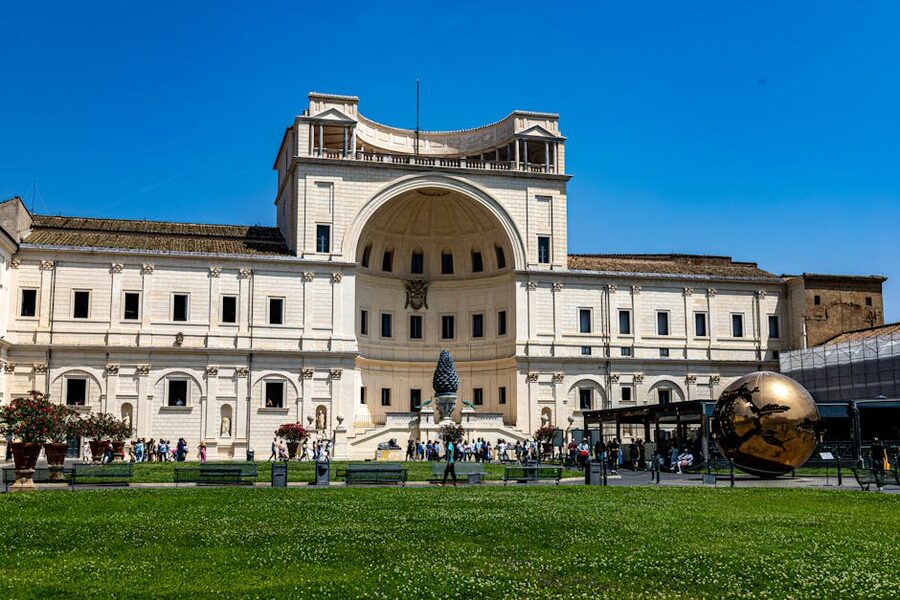Vatican Museums courtyard with crowds of visitors