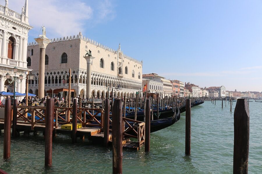Doges Palace and gondolas Venice waterfront