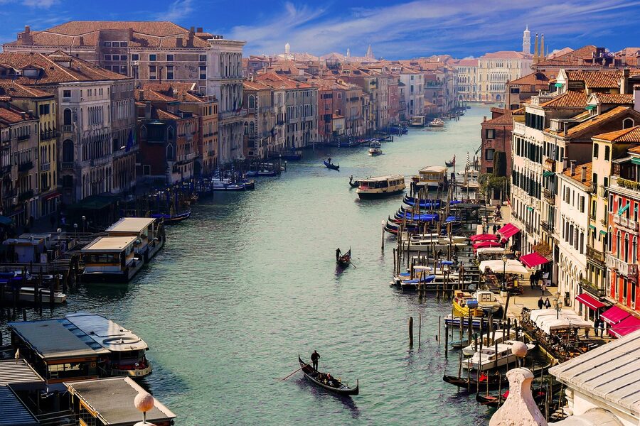 Gondolier rowing on the Canale Grande in Venice