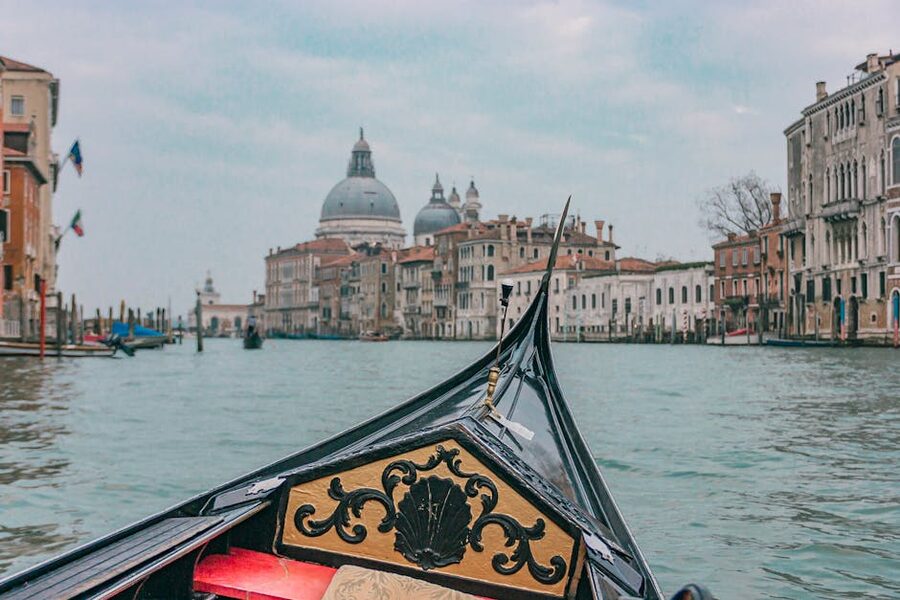 Venice gondola ride on the Grand Canal with basilica view