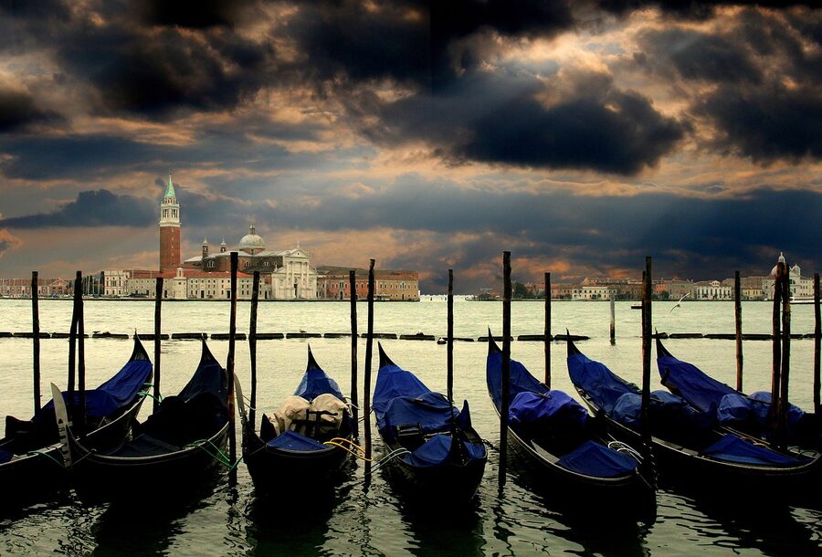 Gondolas docked along the Grand Canal in Venice