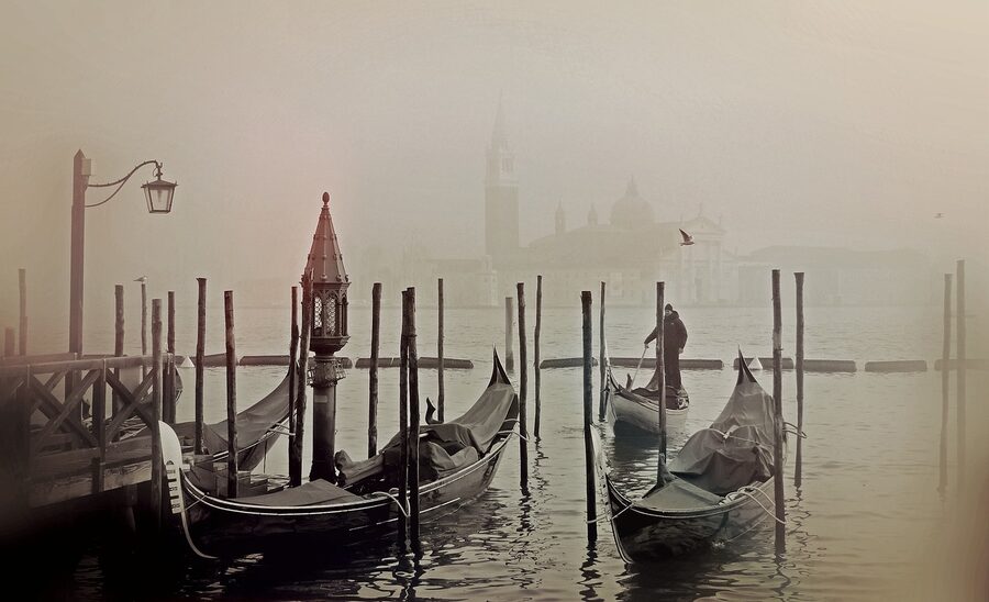 Gondola in misty Venice canal