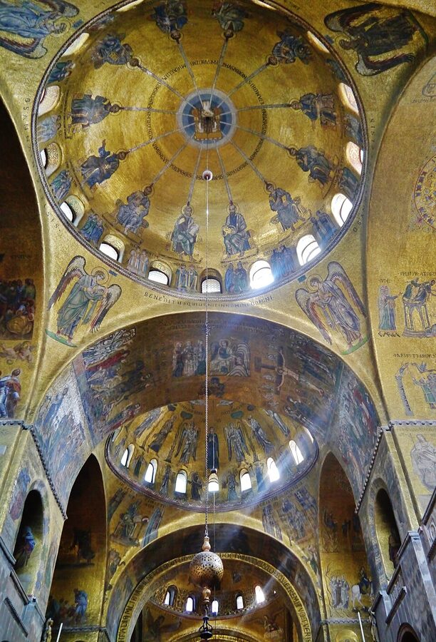 Domes inside St Mark's Basilica showing gold mosaic ceiling