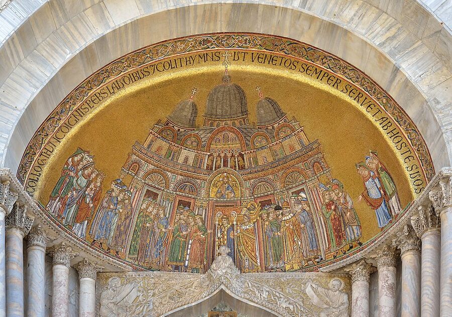 Mosaic on the basilica facade showing Saint Mark's body being received in Venice