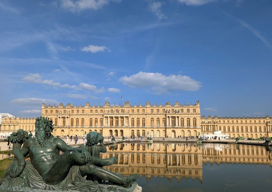 Versailles sculptures and water reflections in gardens