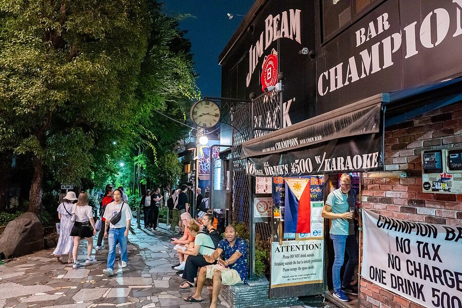 Colorful bar signs and narrow entrance passage in Golden Gai, Shinjuku