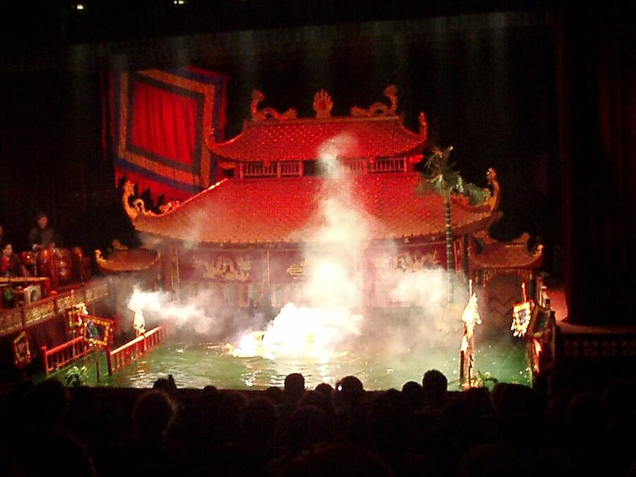 A dragon puppet emerging from the water during the Thang Long water puppet show in Hanoi
