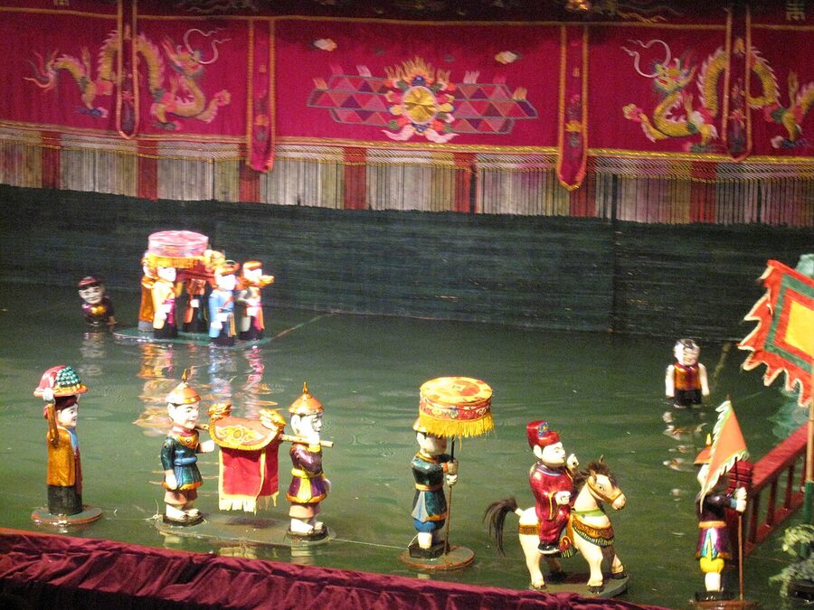 Performers and traditional musicians during the water puppet show at Thang Long Theatre in Hanoi