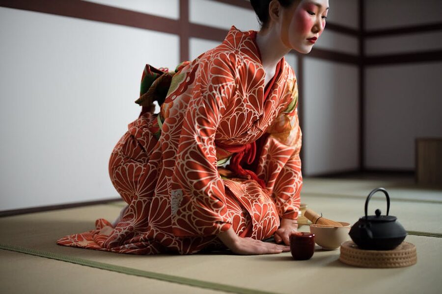 Woman in kimono at traditional Japanese tea ceremony
