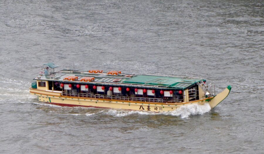 Several modern yakatabune pleasure boats docked at Asakusa waterfront in Tokyo