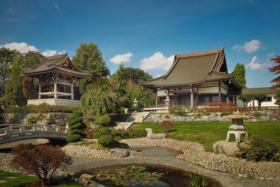 Zen garden with raked sand patterns and stones