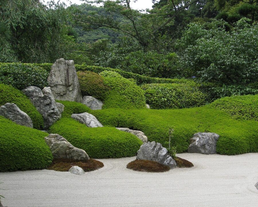 Zen meditation stacked stones by water