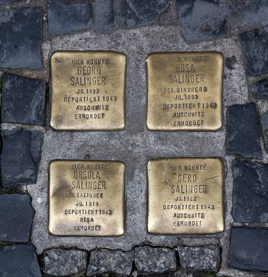 Stolpersteine brass stumbling stones in Berlin pavement