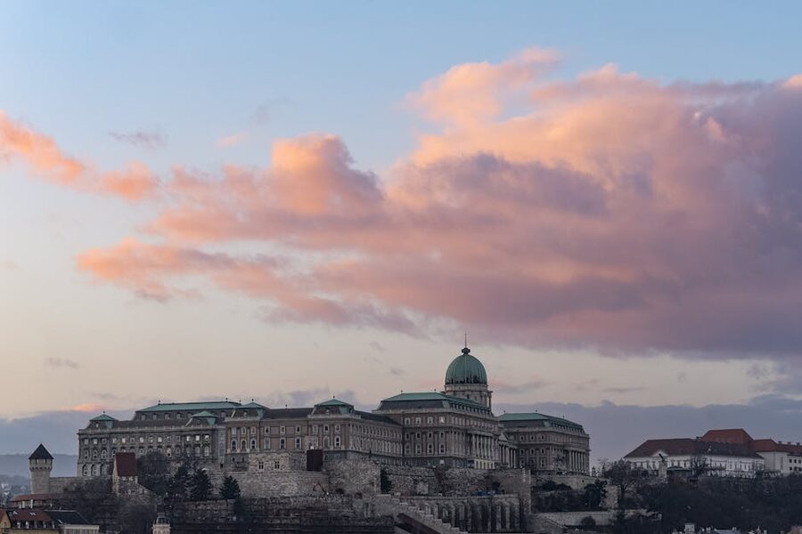 Buda Castle at sunset with dramatic clouds overhead