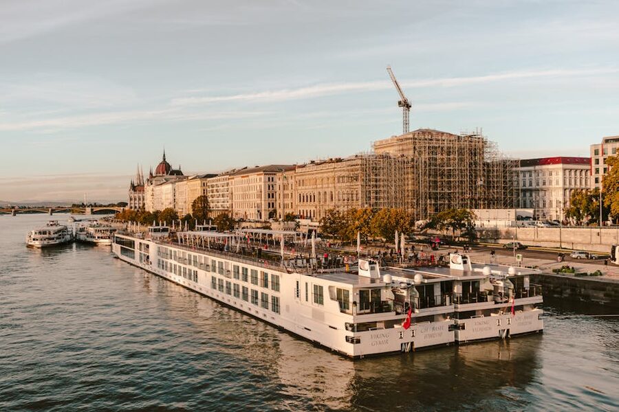 Cruise boat on the Danube River with Budapest architecture