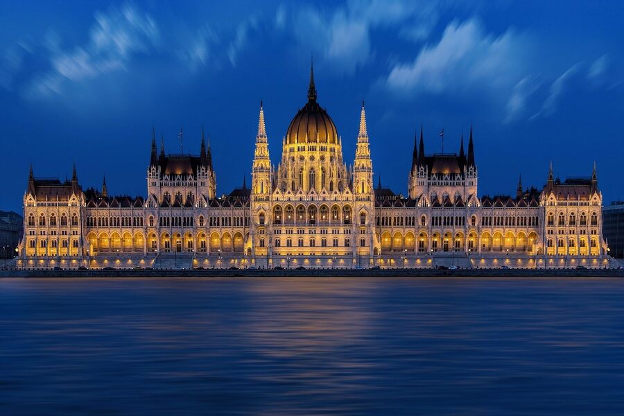 Parliament Building illuminated with river reflection at night