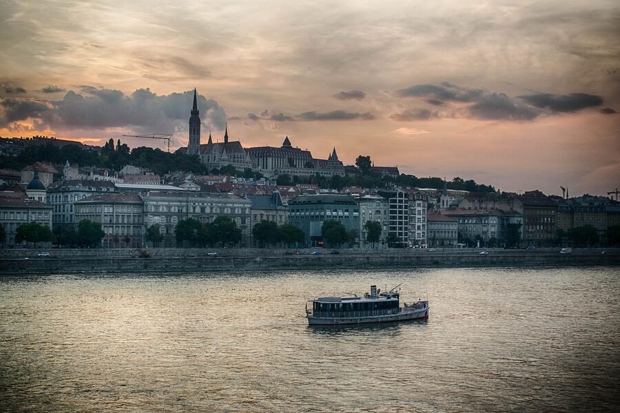 Sightseeing boat on the Danube at dusk in Budapest
