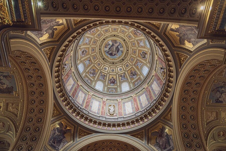 Interior view of dome ceiling and altar inside St Stephens Basilica