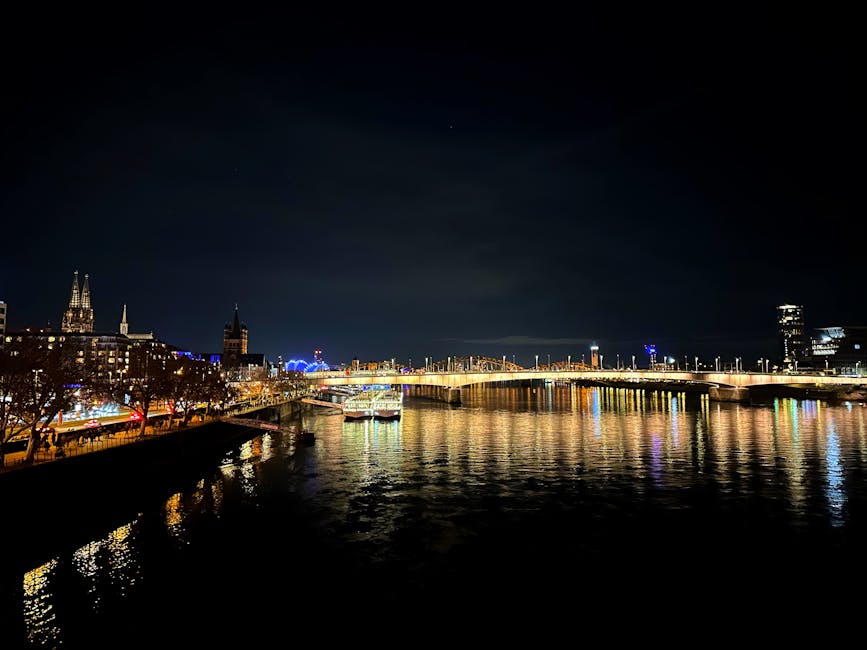 Cologne Rhine river evening skyline with city lights