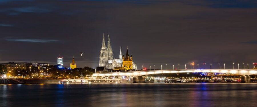 Cologne Cathedral reflected on the Rhine at night