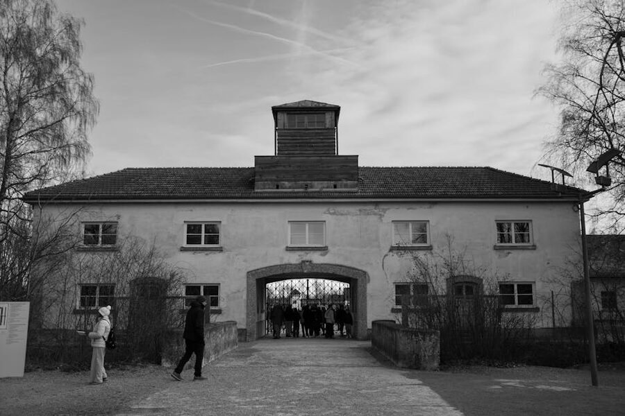 Dachau entrance building in solemn black and white