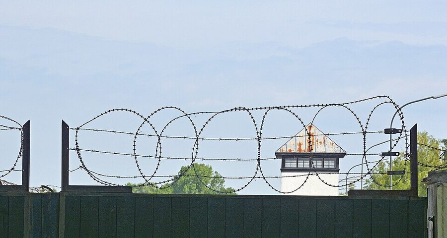 Dachau watchtower with electrified perimeter wire