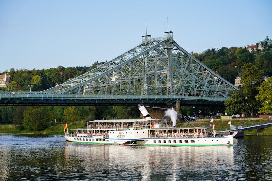 Dresden paddle steamer passes under the Loschwitz Bridge on the Elbe